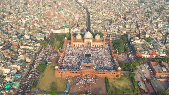 Aerial view of prayer during Eid al-Fitr at Jama Masjid in Delhi, India. alt