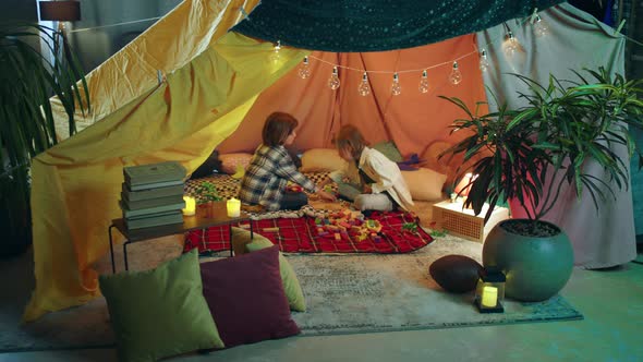 Inside a Very Hippy Looking Sheet Tent with Plants