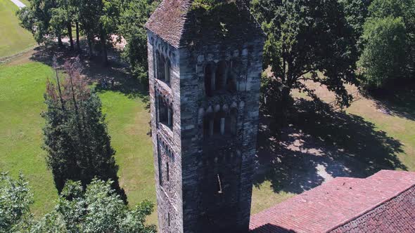 Above View of Isolated Old Catholic Christian Romanesque Church with Bell Tower in Nature Outdoor