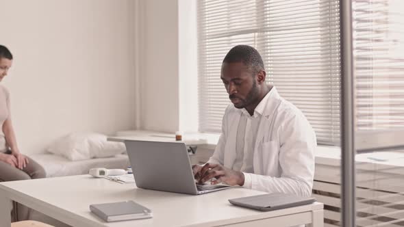 Female Patient at Medical Checkup in Clinic alt