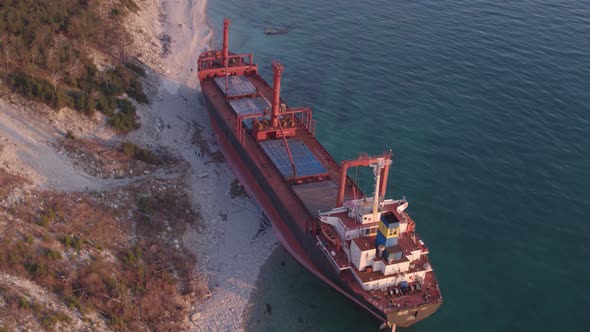 The Ship Ran Aground. Environmental Pollution at Sea. Aerial View. Grounded Ship. Drone Footage alt