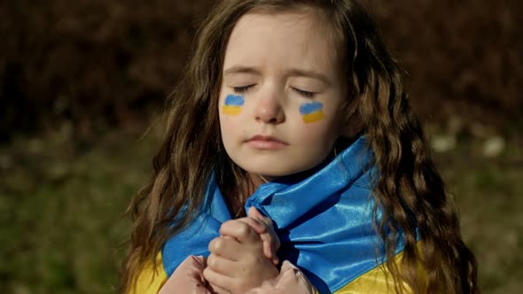 Portrait of a Little Praying Ukrainian Girl