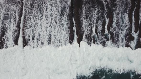Waves Breaking Over a Shallow Reef