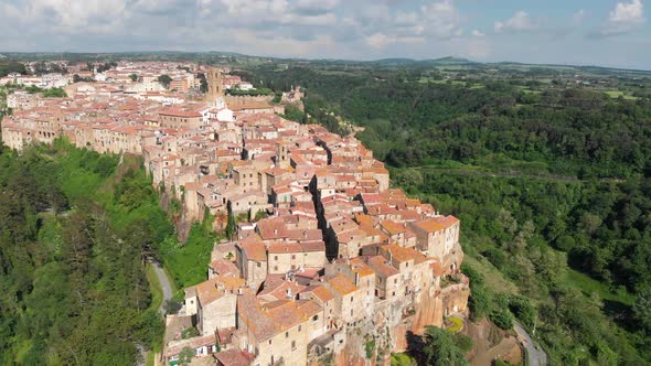 Pitigliano, Italy. Old Houses That Protrude From a Large Outcrop of Tuff