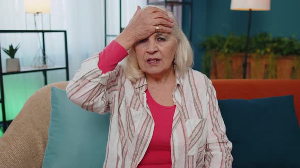 Upset Senior Old Woman Making Face Palm Gesture Feeling Bored Disappointed in Result Bad News alt