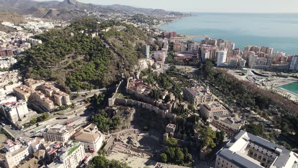 Aerial forward over Malaga historic city, Spain