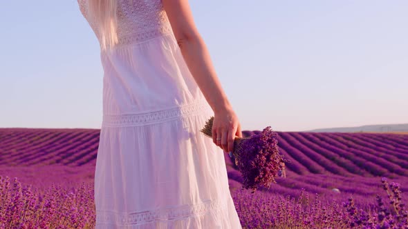 Close Up of Female in White Dress on Lavender Field