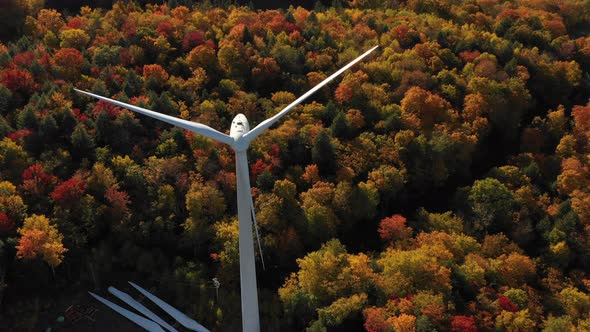 Clean Energy Windmill turbine wind farm aerial during beautiful autumn leaf season alt