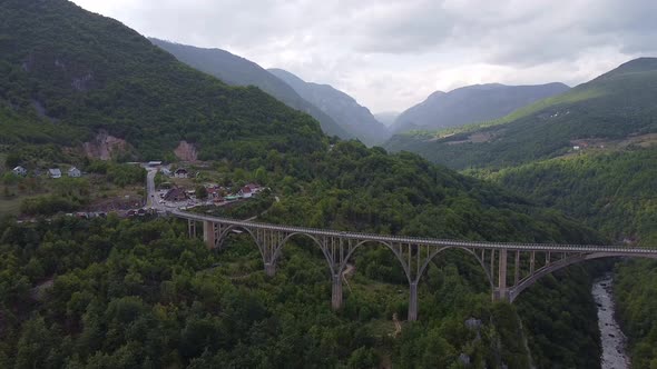 Long Road Bridge Over a Valley in the Mountains