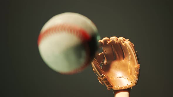 Dynamic flying baseball catch in the spotlight. Epic foggy slow motion shot 4KHD alt