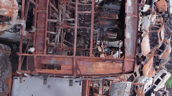 Vertical Video of a Dump of Cars Destroyed By the War in Ukraine alt