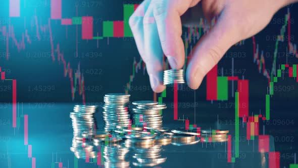 Coins are Getting Added to a Pile on a Display with Stock Rates alt
