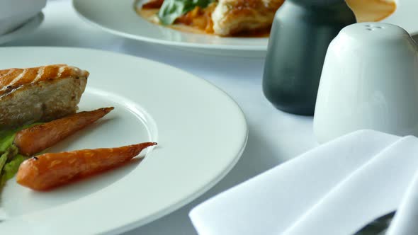 Grilled salmon meat steak with vegetable alt