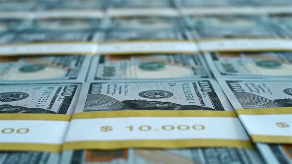 Wads Of One Hundred USA Dollar Bills alt