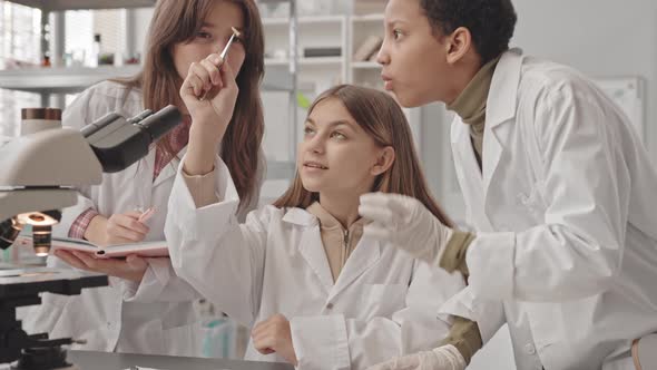 Students Examining Samples in Science Class alt