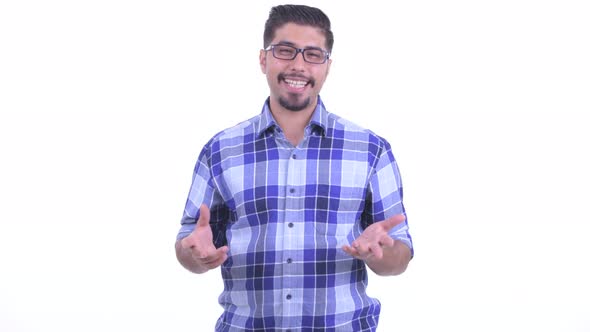Happy Bearded Persian Hipster Man Explaining Something alt