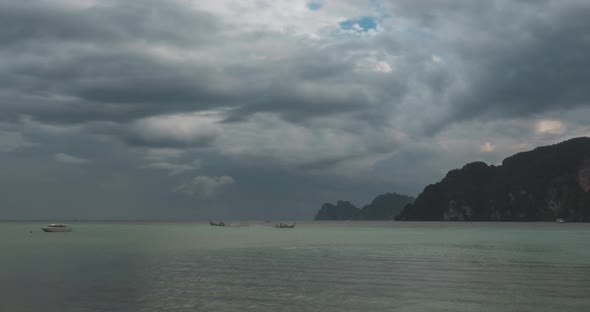 Time Lapse of Rain Clouds Over Beach and Sea Landscape with Boats. Tropical Storm in Ocean. alt