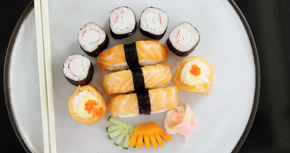 Various sushi served on plate alt