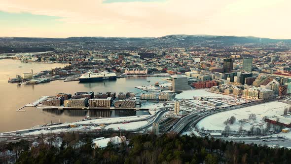 Sorengautstikkeren Neighborhood And City Of Oslo In Winter From Ekebergparken In Norway. - aerial alt
