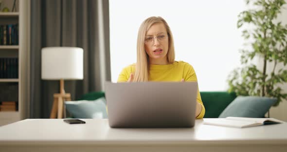 Woman Having Video Call on Laptop