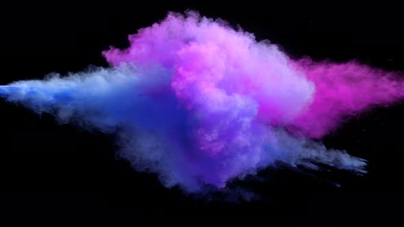 Super Slowmotion Shot of Color Powder Explosion Isolated on Black Background alt