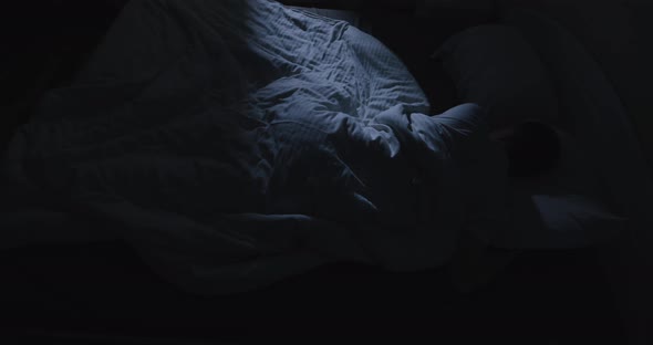 Man Suffers From Insomnia and Cannot Sleep alt