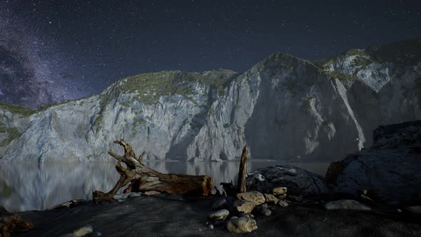Hyperlapse of Night Starry Sky with Mountain and Ocean Beach in Lofoten Norway alt