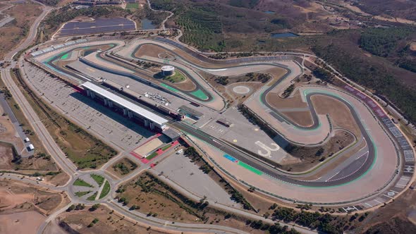 Aerial Video Shooting of the Racetrack for Cars and Motorcycles a View From the Sky alt