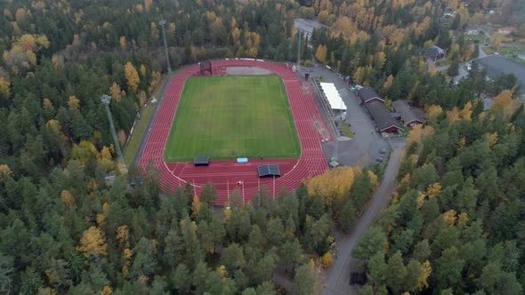 Aerial View of Soccer Field in Forest