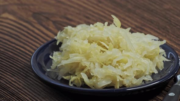 Fresh homemade sauerkraut in a bowl. Fermented cabbage. Vegan food.