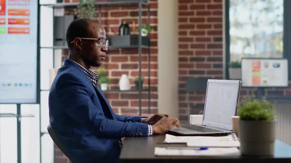 African American Consultant Working on Business Strategy alt