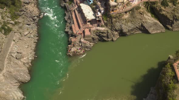 Devprayag, India, alakananda and bhagirathi holy rivers mix to become ganges, 4k aerial drone view alt