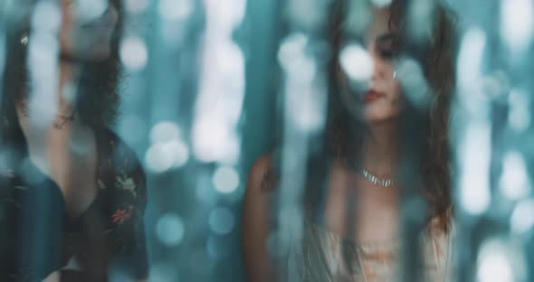 Two women dance together alt