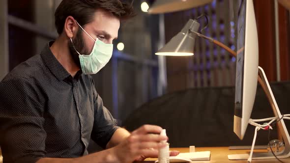 Businessman Cleaning Disinfection Hands In Office Antiseptic For Covid-19.Health And Safety Concept. alt