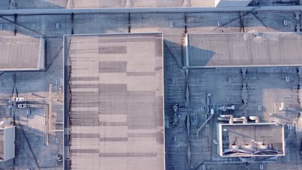 Roof inspection with drone. Remote search for defects in the equipment on roof. alt