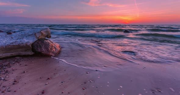 Timelapse of Sunset at Baltic Seashore Soft Evening Light with Stones