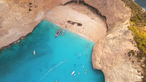 Aerial drone view of the Navagio beach on the Ionian Sea coast of Zakynthos, Greece alt