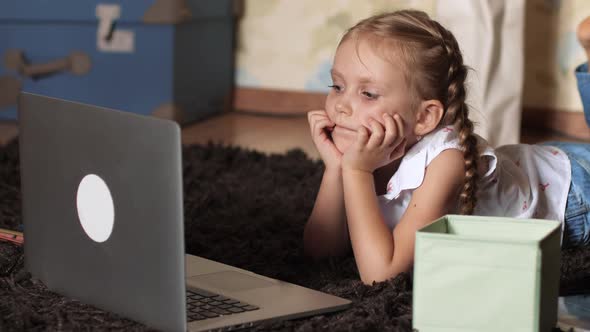 Girl preschooler on distance learning