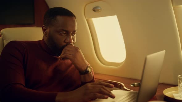 Serious Guy Looking Laptop Screen Closeup alt