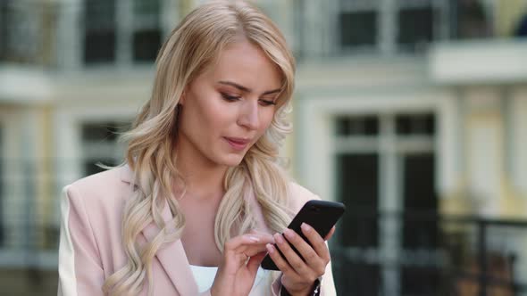Portrait Businesswoman Receiving Good News. Woman Reading Good News Outdoor alt
