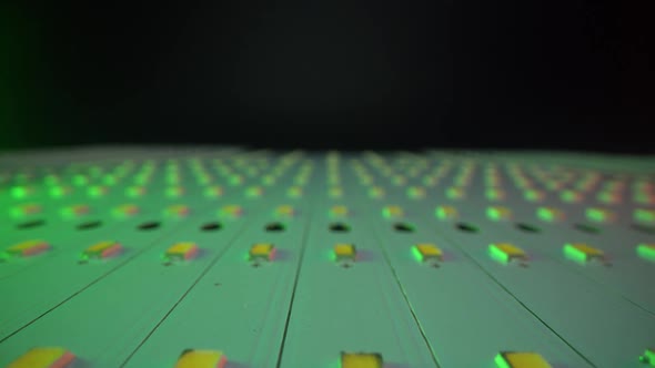 Factory of Create and Manufacture New Mordern Light LED Panels. Dolly Shot Above Panels in Macro alt