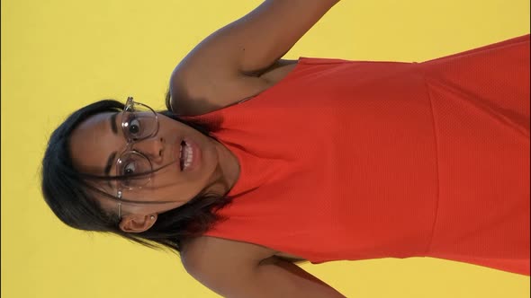 African Young Woman Saying "I Don't Know" and Spreading Her Hands To the Sides. alt