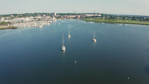 Sunrise Aerial Drone Flyover of Suburban Harbor with Boats (Norwalk, Connecticut) alt