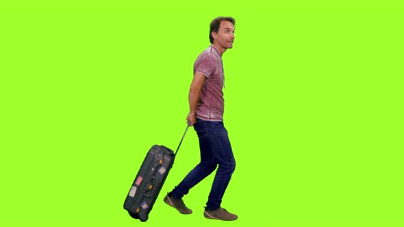 Man Tourist Goes with Luggage 