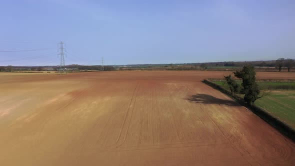 Aerial photo of a beautiful farmers field in the spring time in the town of Wetherby in Leeds alt