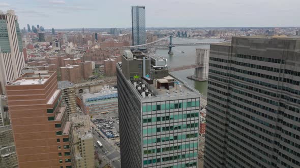 Forwards Fly Over Modern High Rise Building alt
