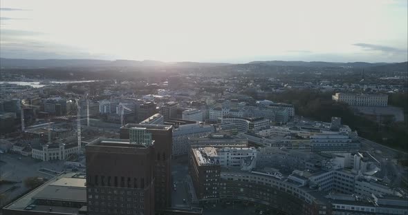 Aerial shot of Oslo City Hal, Rådhuset and construction cranes in background, Norway alt