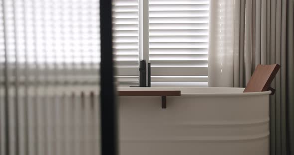 Transparent Sliding Door Closed Inside the Modern Bathroom Minimalist Bathtub alt