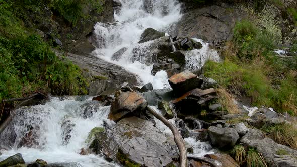 View of Waterfall Scenes in Mountains, National Park Dombay, Caucasus, Russia