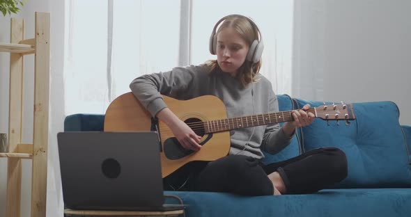 A Teenager Learns Two Chords on the Guitar alt